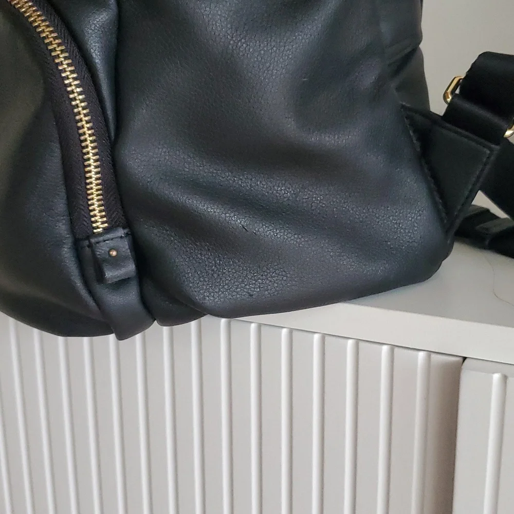 Tumi Voyageur Halle Black Leather Backpack with Gold Hardware